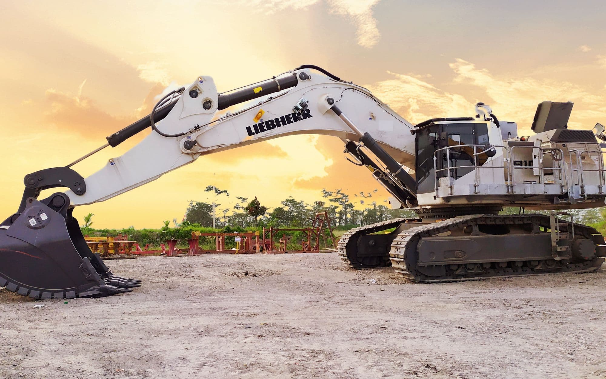 Liebherr R 914 crawler excavator at golden hour